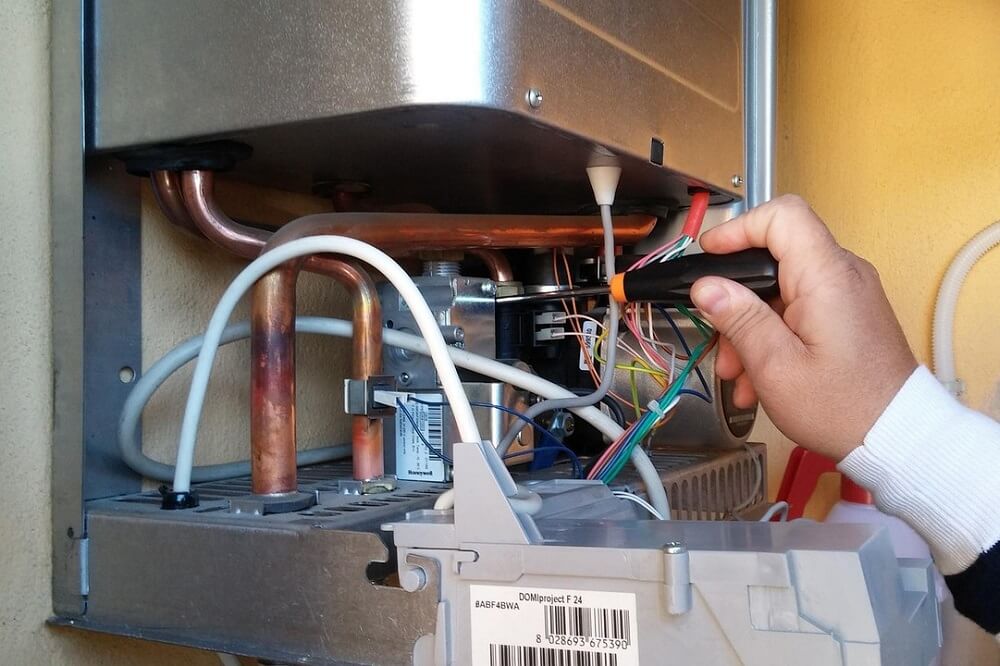 How do indirect water heaters work and when should they be used?
